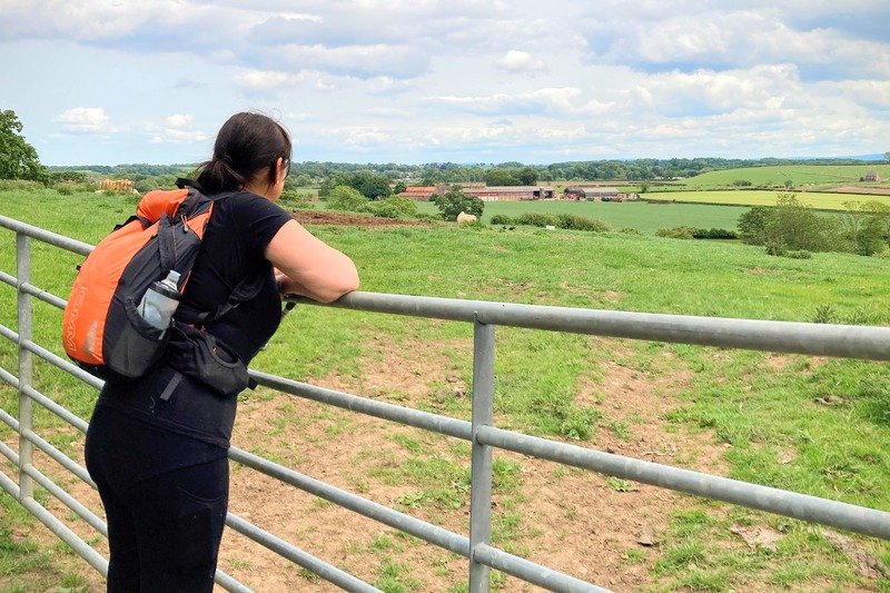 Hiker viewing peaceful Tees Valley landscape